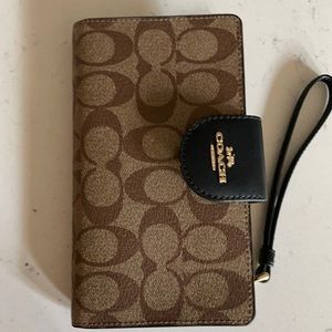 Coach wristlet with phone compartment